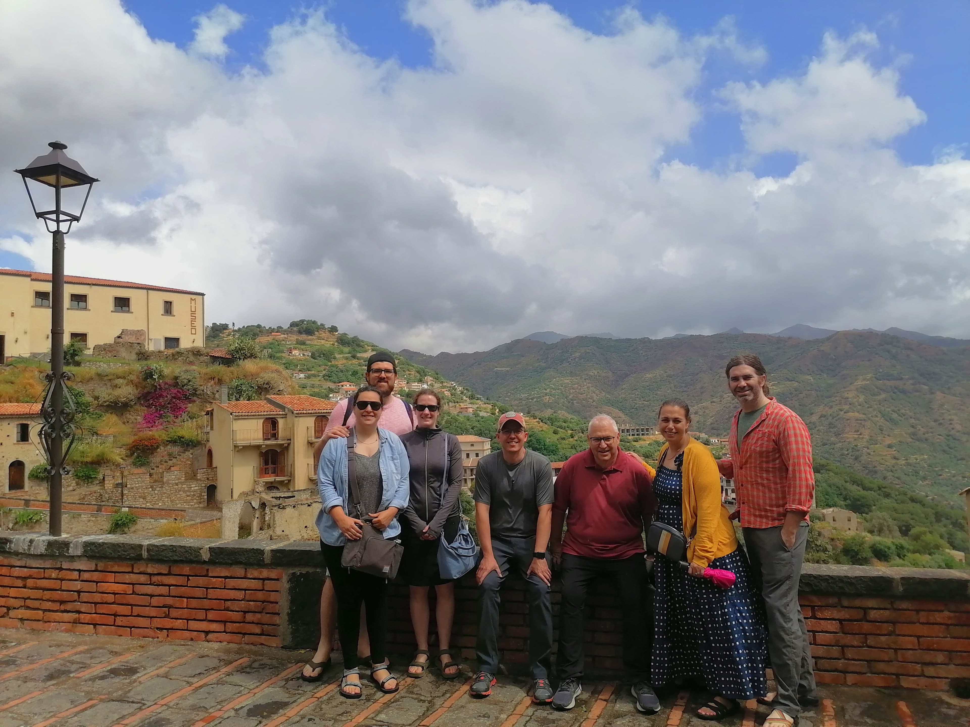 Guests visiting their ancestors' hometown during a personalized Sicily genealogy tour