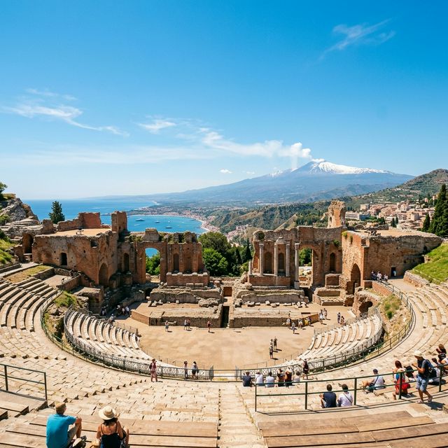 Taormina Greek Theatre panoramic view coastline and Mount Etna